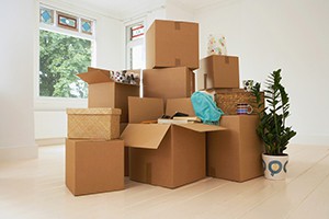 Как эффективно собрать вещи при переезде